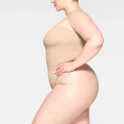 SEAMLESS SCULPT STRAPLESS THONG BODYSUIT |-Skims Outlet
